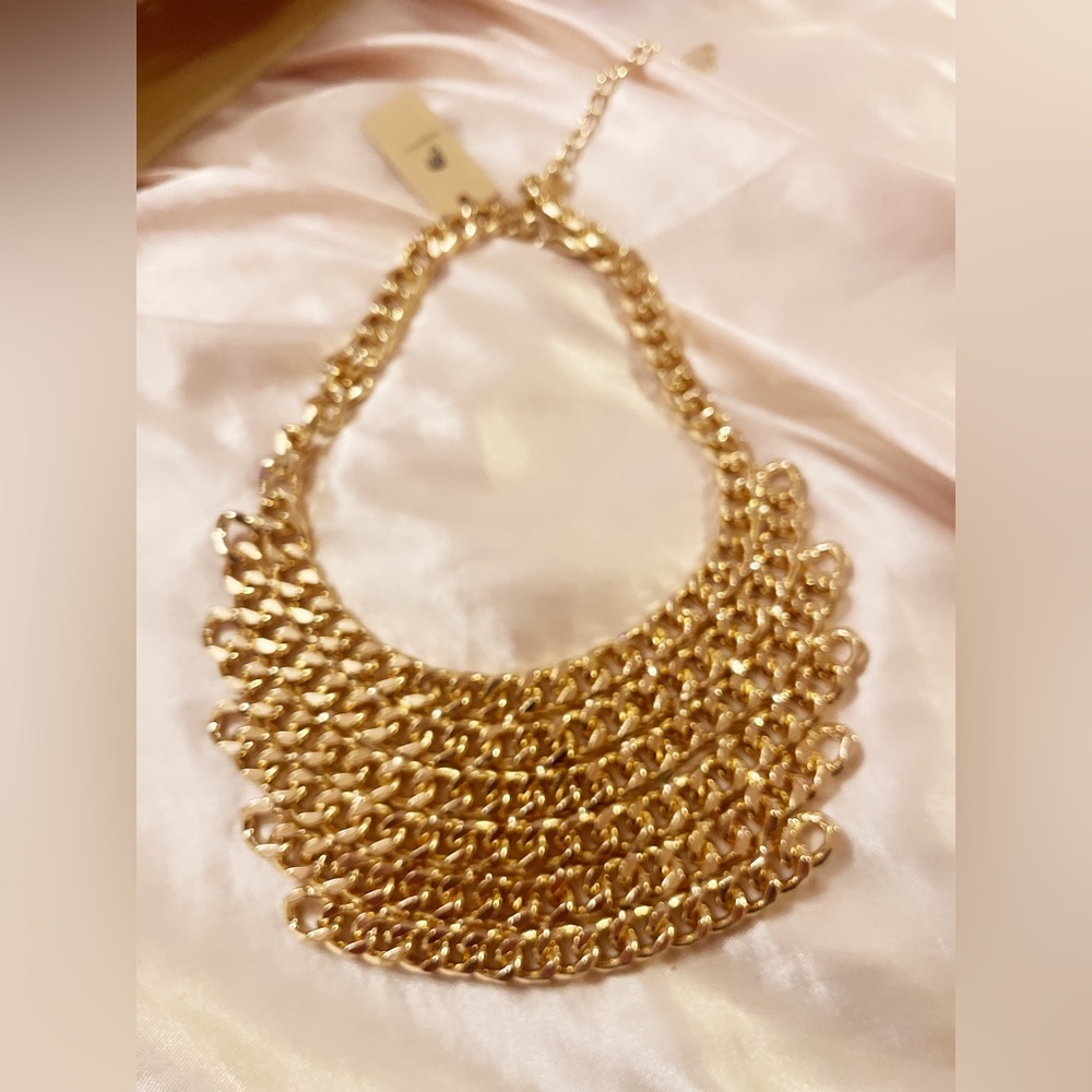 Chunky funky golden statement necklace.